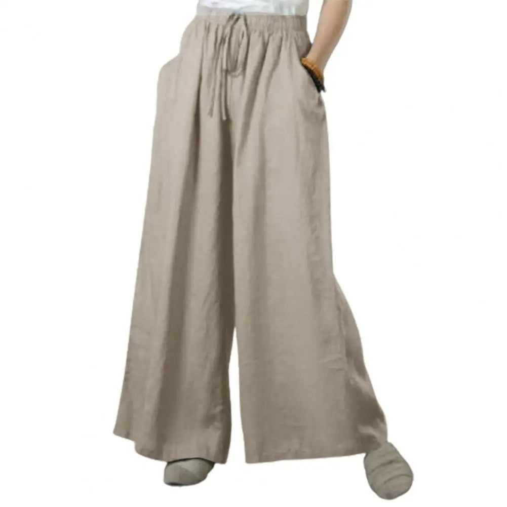 Beige komfortable vide bukser for kvinner, en allsidig casual stil perfekt for vår- og sommerdager.