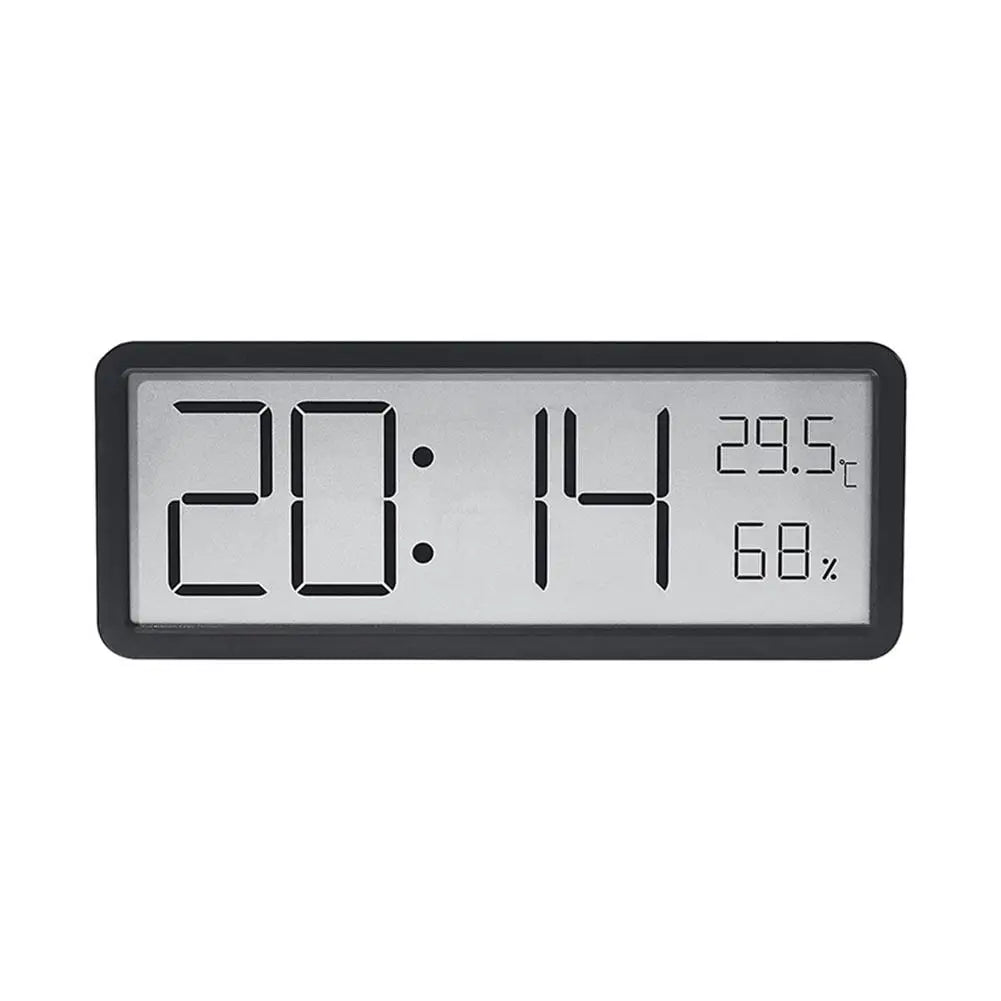 Minimalistisk digital LED veggklokke i sort, med justerbar lysstyrke. Ideell for soverom og moderne interiør.
