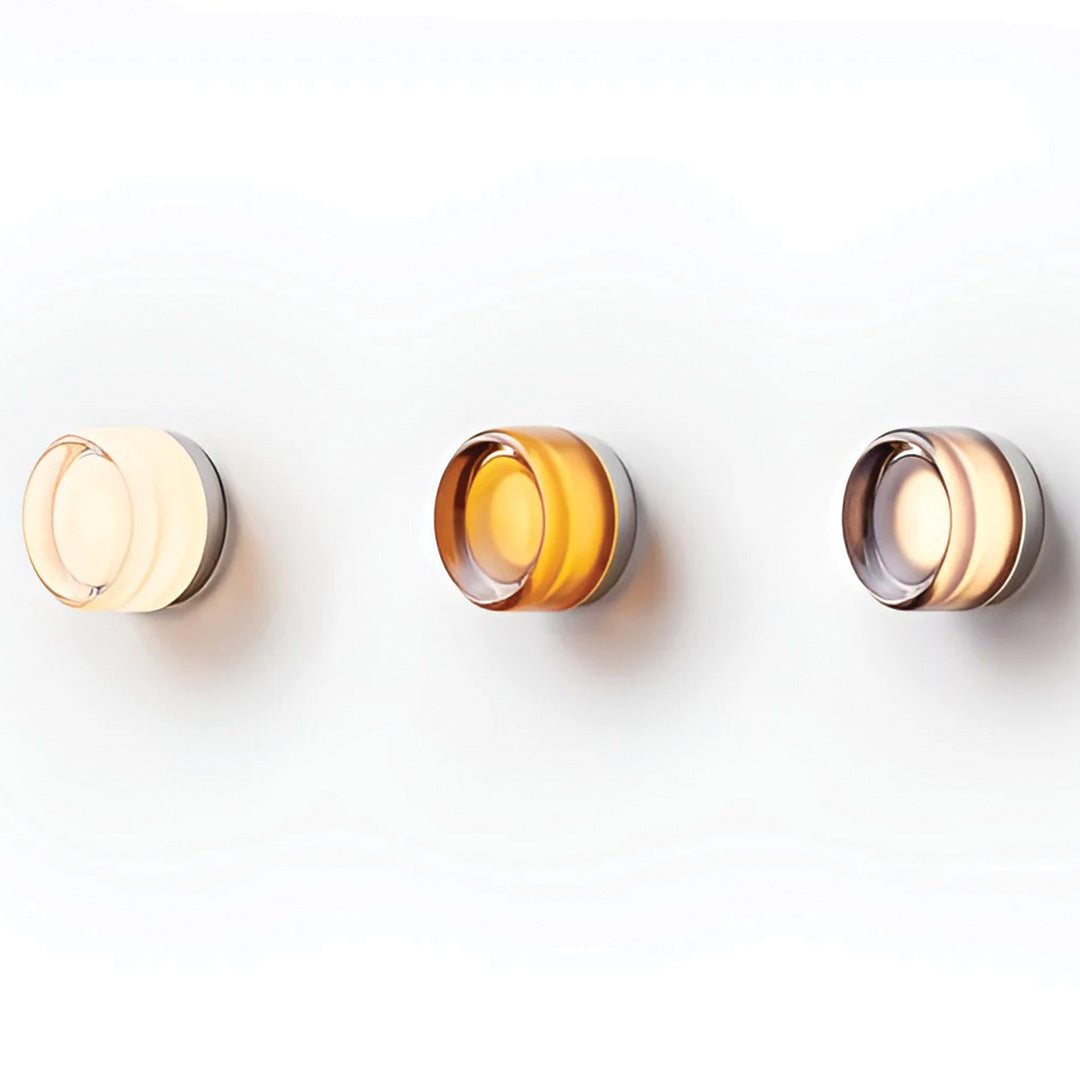 Soveromslampe DimpleGlow: moderne LED vegglampe som skaper koselig stuebelysning.