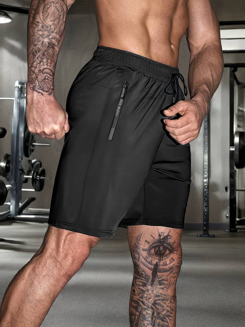 "Moderne grå og svarte Gymfit Premium shorts, frontvisning, designet for komfort og fleksibilitet under trening."