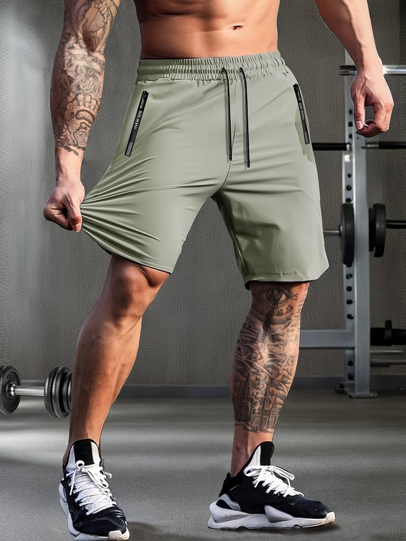 "Moderne grå og svarte Gymfit Premium shorts, frontvisning, designet for komfort og fleksibilitet under trening."