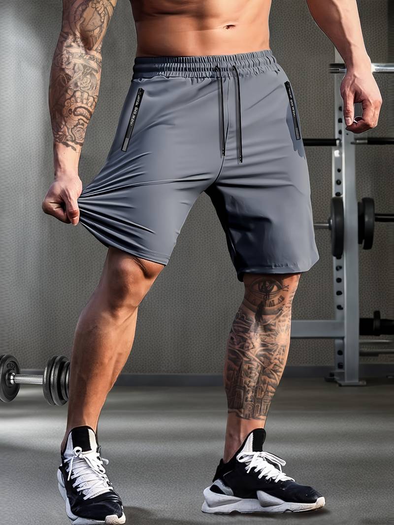 "Moderne grå og svarte Gymfit Premium shorts, frontvisning, designet for komfort og fleksibilitet under trening."