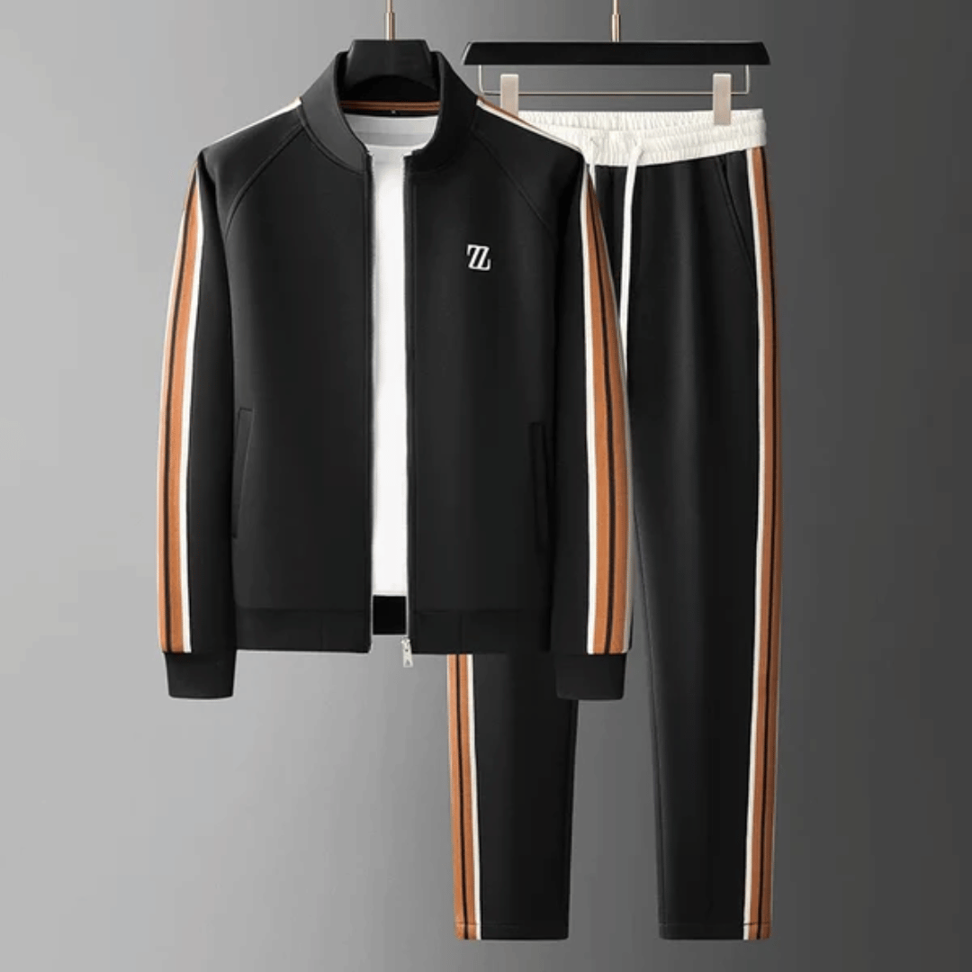 Mann i moderne herre treningsdress strekker. Ideelle sportsklær for gym, trening og aktiv livsstil.