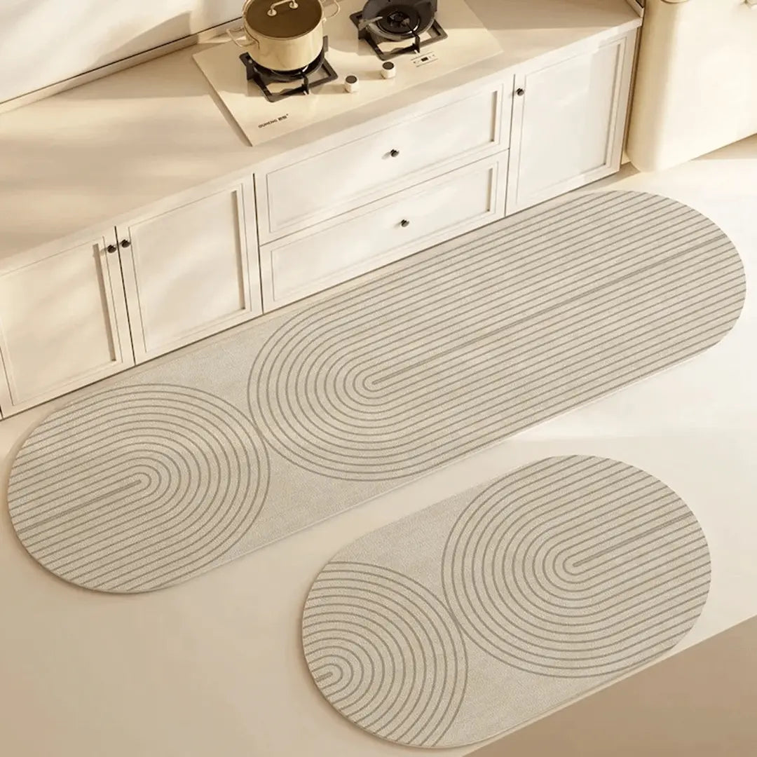Praktisk absorberende kjøkkenteppe for enkelt renhold. Perfekt for søl og fukt på kjøkkengulvet.