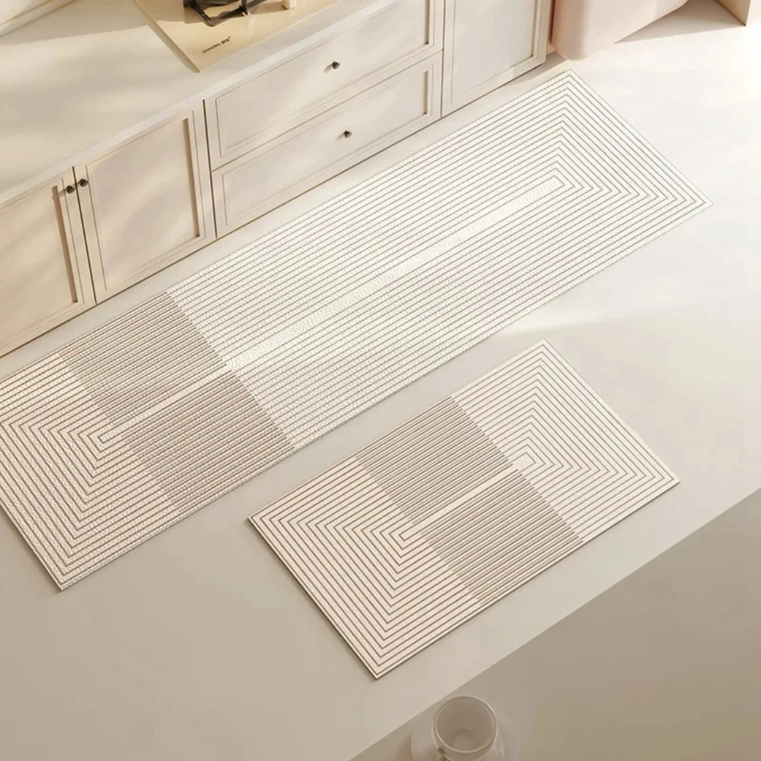 Elegant og praktisk kjøkkenteppe i moderne design. Sklisikker og absorberende for optimal funksjon.