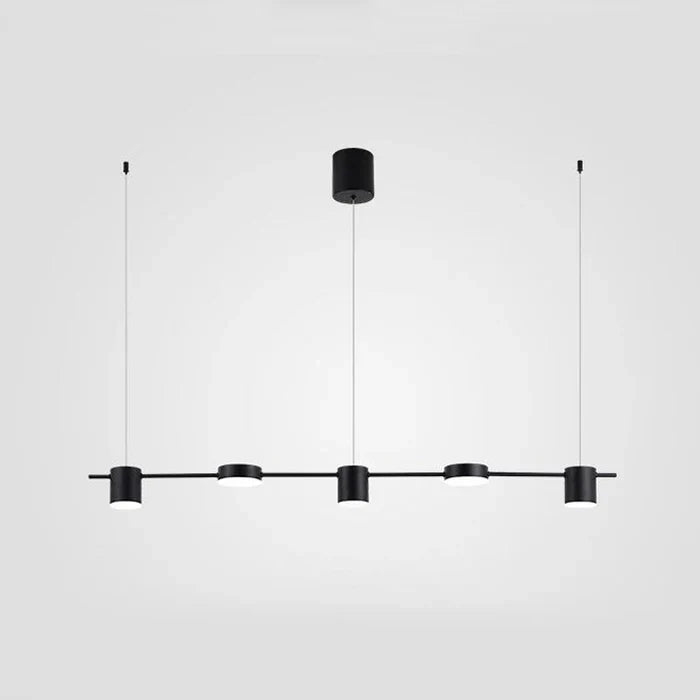 Gullfarget LED pendellampe i aluminium, skaper varmt stemningslys i moderne interiørdesign.