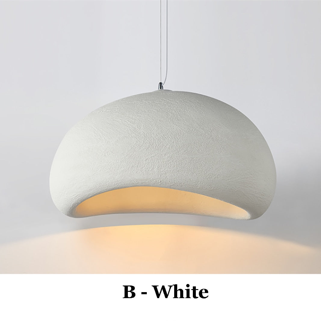 Interiørbelysning: Elegant pendellampe for stue, tilfører luksus og design.
