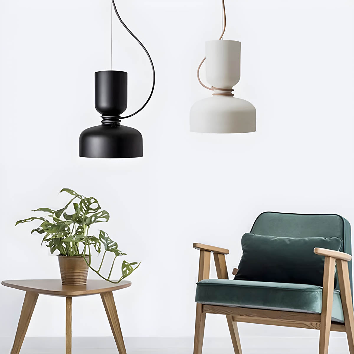"Moderne pendellampe med geometrisk design, sirkulær form, og dristige kurver, perfekt for interiørbelysning."