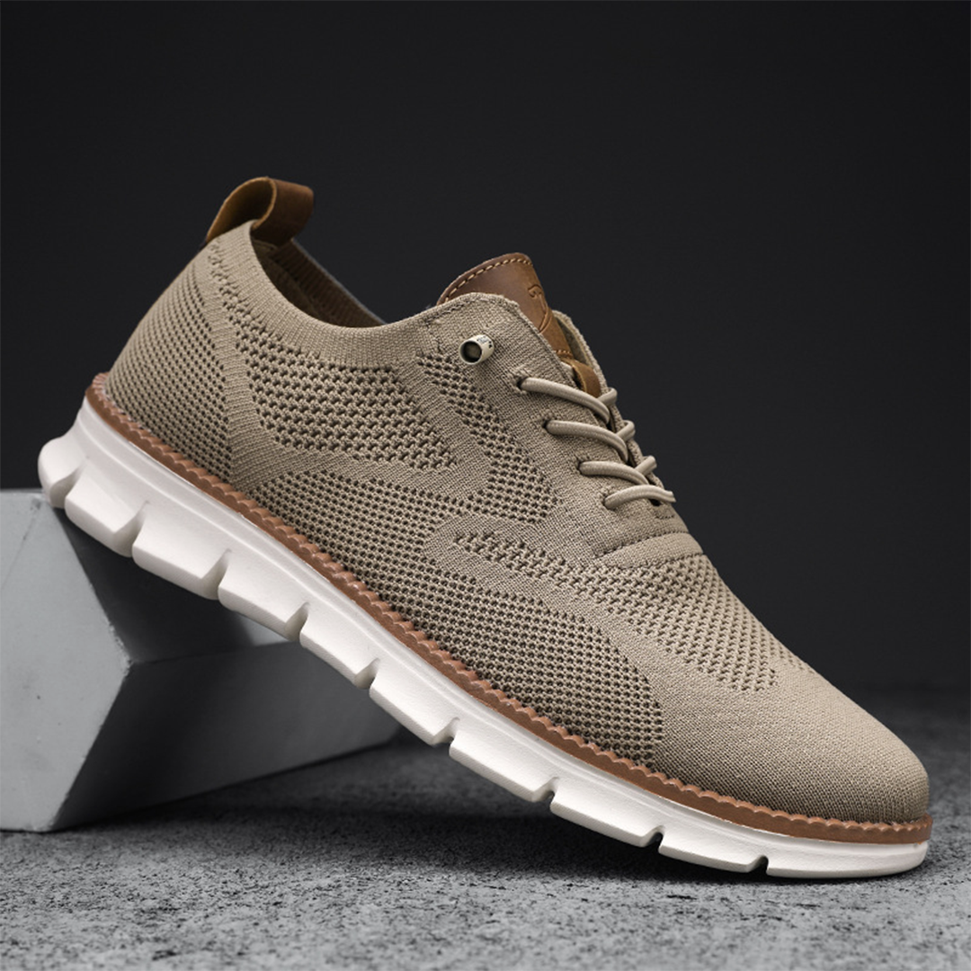 "Moderne svarte pustende sneakers for menn, lettvektsdesign med mesh, fleksibel såle for komfort og stil."