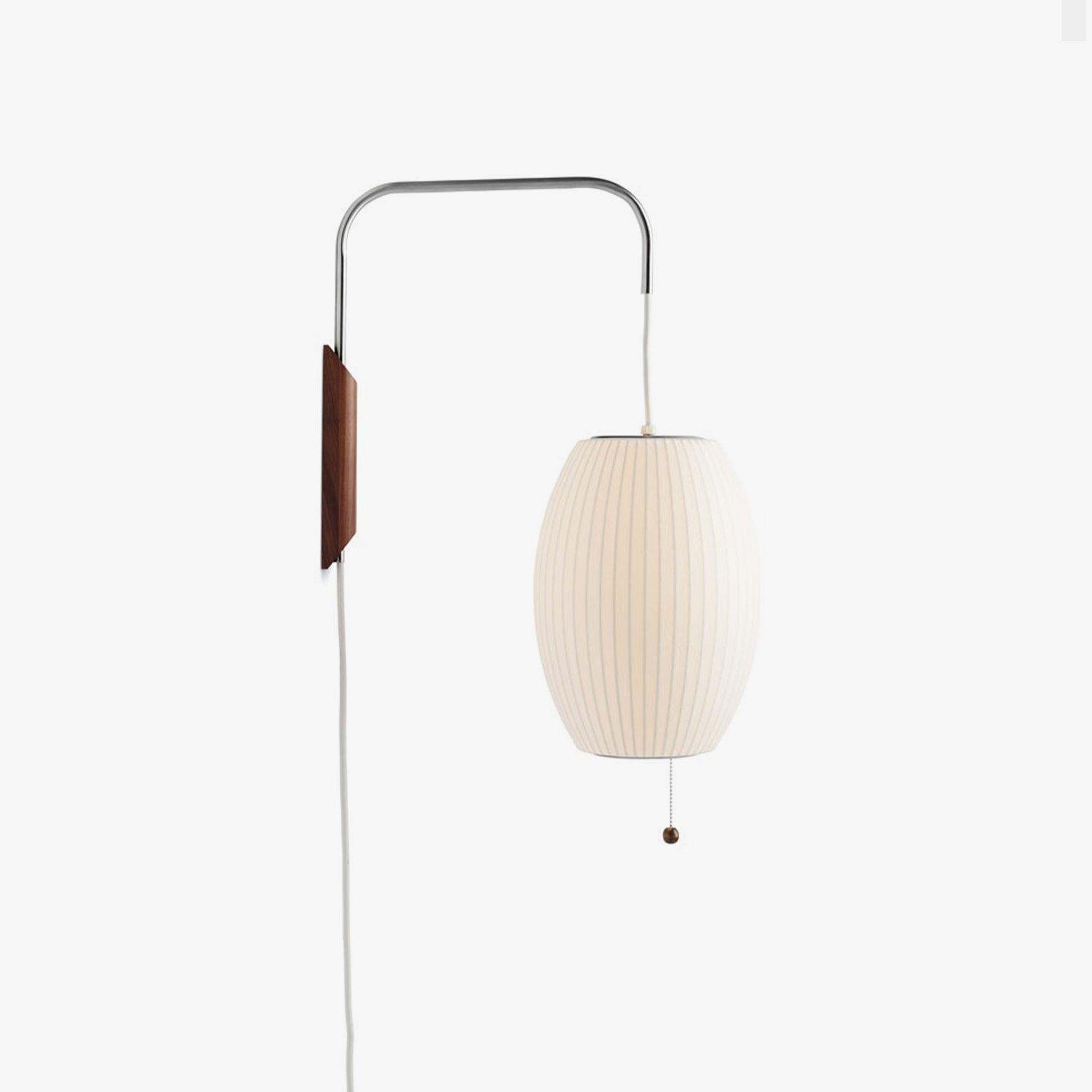 Moderne vegglampe med elegant design, polymer og stål, diffust lys, perfekt for soverom og oppholdsrom.