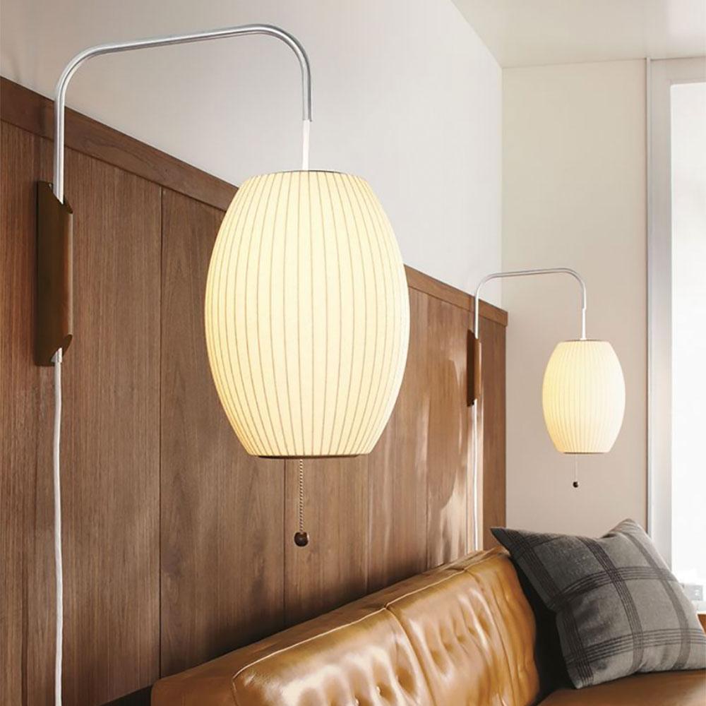 Moderne vegglampe med elegant design, polymer og stål, diffust lys, perfekt for soverom og oppholdsrom.