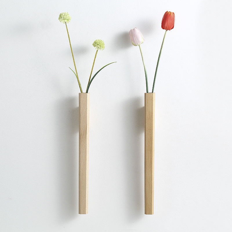 Minimalistisk veggvase i tre, perfekt for små planter og moderne interiørdesign