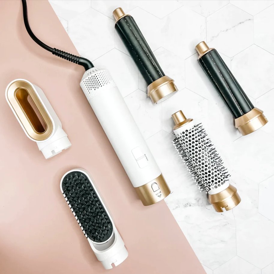 "Multifunksjonell 5-i-1 airstyler for proff hårstyling, med utskiftbare børstehoder og Coanda-effekt teknologi."
