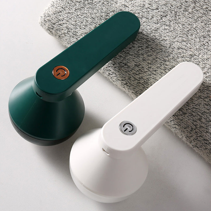 Oppladbar hvit/grønn stofflofjerner med kraftig motor for glatte plagg, stilrent design og bionic-honeycomb mesh.