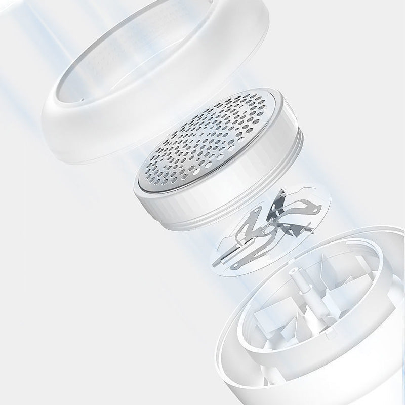 Oppladbar hvit/grønn stofflofjerner med kraftig motor for glatte plagg, stilrent design og bionic-honeycomb mesh.