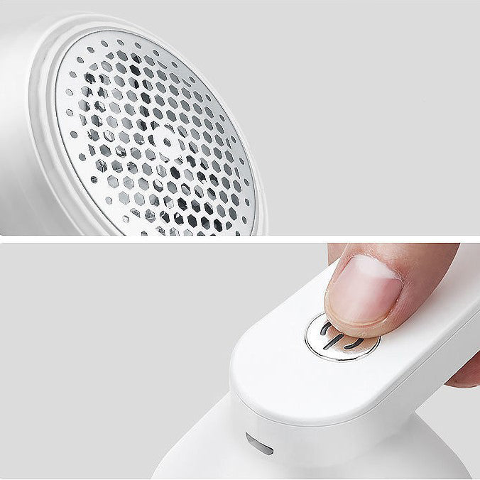 Oppladbar hvit/grønn stofflofjerner med kraftig motor for glatte plagg, stilrent design og bionic-honeycomb mesh.