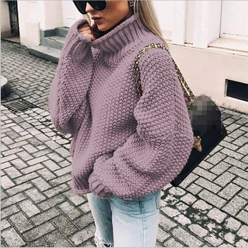 Komfortabel oversized strikkegenser for kvinner med høy hals og stilige batwing-ermer, perfekt for høst/vinter.