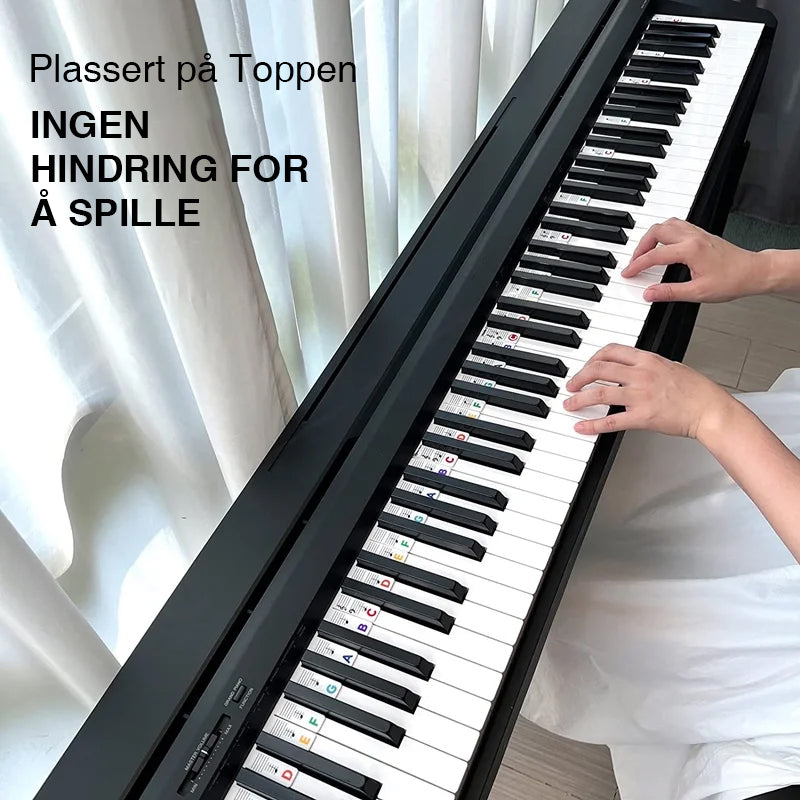 "Piano silikonetiketter for nybegynnere, fargerike avtakbare noteskilt som viser diskant- og bassstaver tydelig."