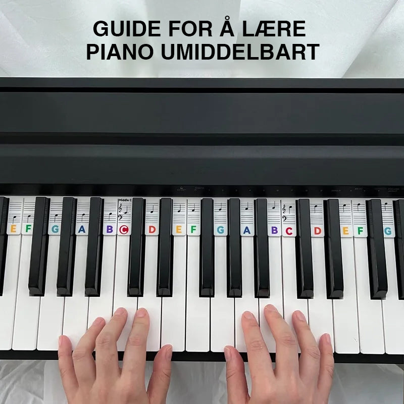 "Piano silikonetiketter for nybegynnere, fargerike avtakbare noteskilt som viser diskant- og bassstaver tydelig."