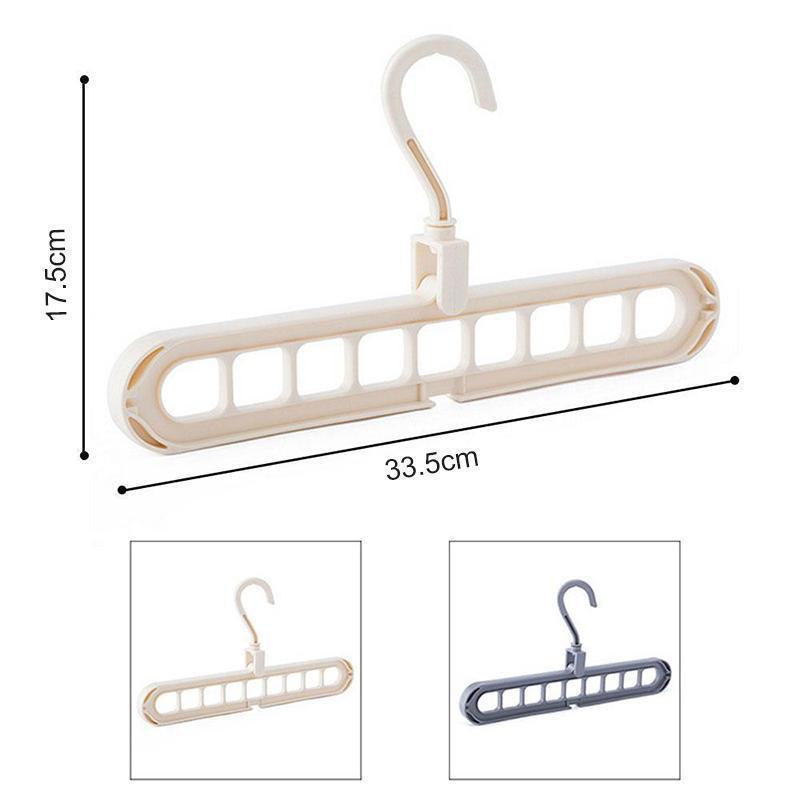 "Plassbesparende kleshenger med 9 hull, roterbar design, solid hvit plast for effektiv organisering av klær."