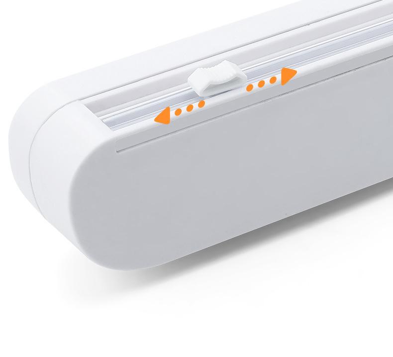 "Plastfoliekutter på kjøkken, slitesterkt ABS, moderne design med toveis kutterhode, sikker bunn med mikrosug."