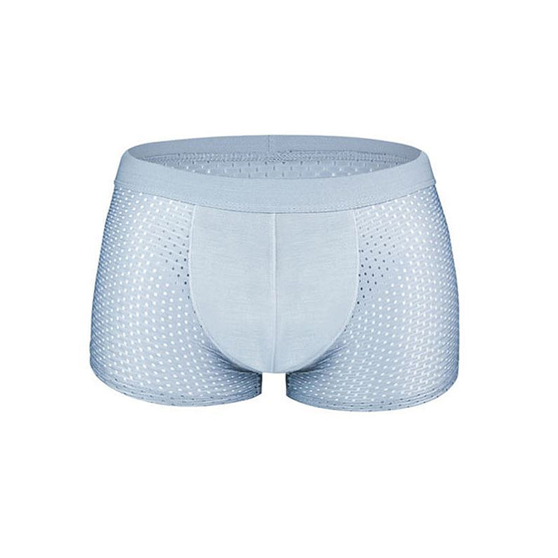 "Pustende issilke boksershorts med kjølende effekt, elegant design og bikakestruktur for optimal ventilasjon og komfort."
