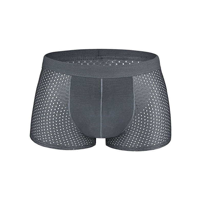 "Pustende issilke boksershorts med kjølende effekt, elegant design og bikakestruktur for optimal ventilasjon og komfort."
