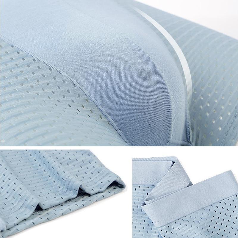 "Pustende issilke boksershorts med kjølende effekt, elegant design og bikakestruktur for optimal ventilasjon og komfort."