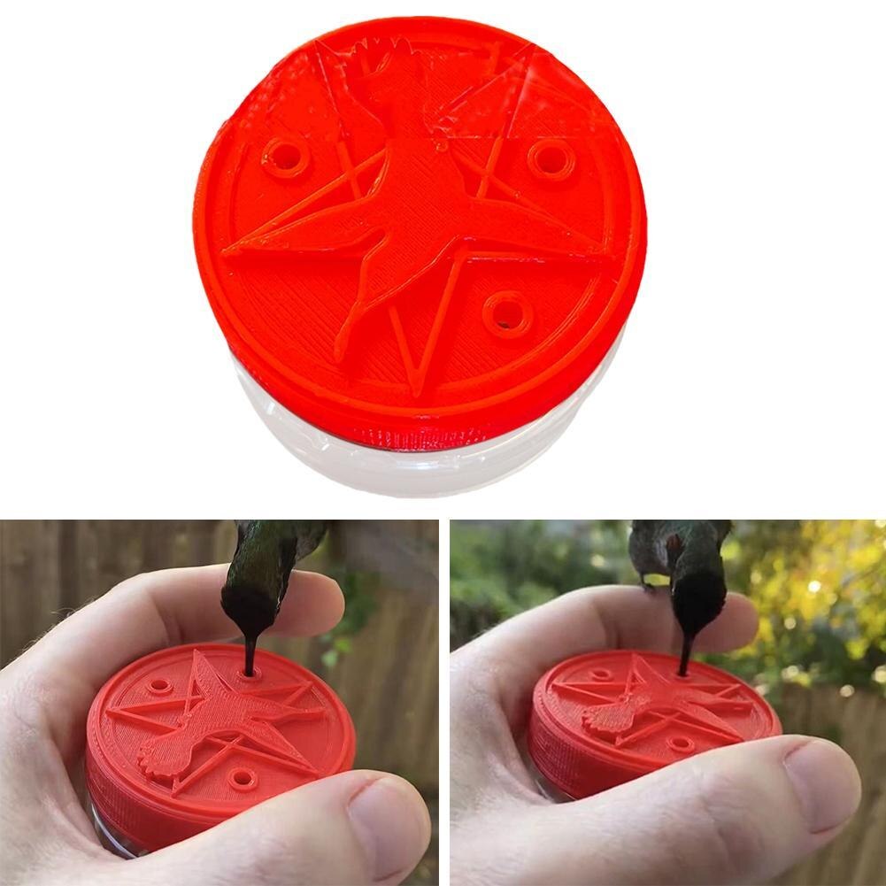 Ergonomisk fuglemater for kolibrier, med lettfyllbar beholder, ideell for utendørs fugletitting.