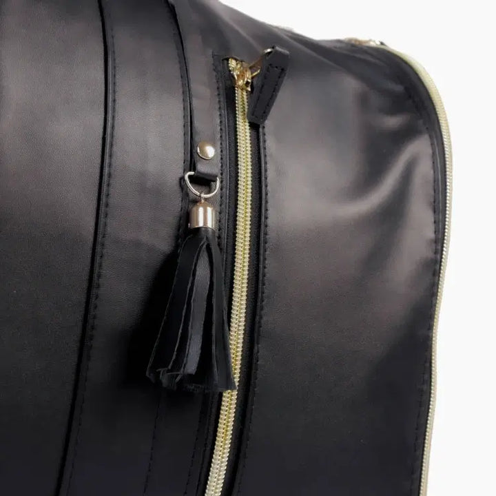 "Romslig JenniBag håndbagasje i beige, 60L, med avtakbare hjul og innovativ design for moderne reisende."