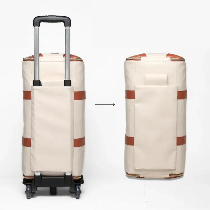 "Romslig JenniBag håndbagasje i beige, 60L, med avtakbare hjul og innovativ design for moderne reisende."