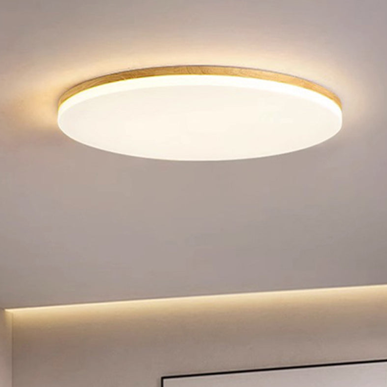"Rund LED taklampe i akryl, elegant design, energieffektiv, moderne belysning, jevn lysfordeling, stilren interiør."