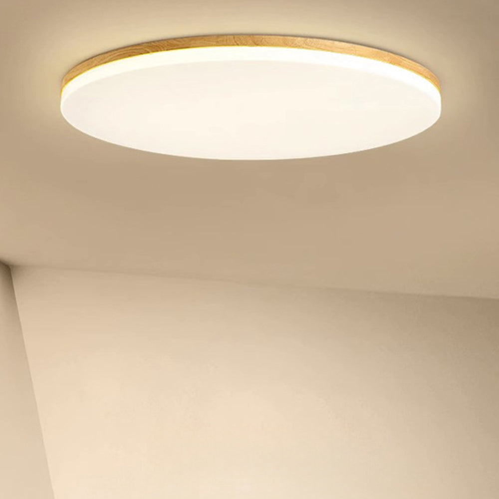 "Rund LED taklampe i akryl, elegant design, energieffektiv, moderne belysning, jevn lysfordeling, stilren interiør."