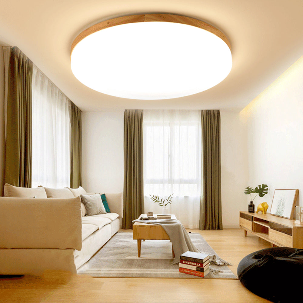 "Rund LED taklampe i akryl, elegant design, energieffektiv, moderne belysning, jevn lysfordeling, stilren interiør."