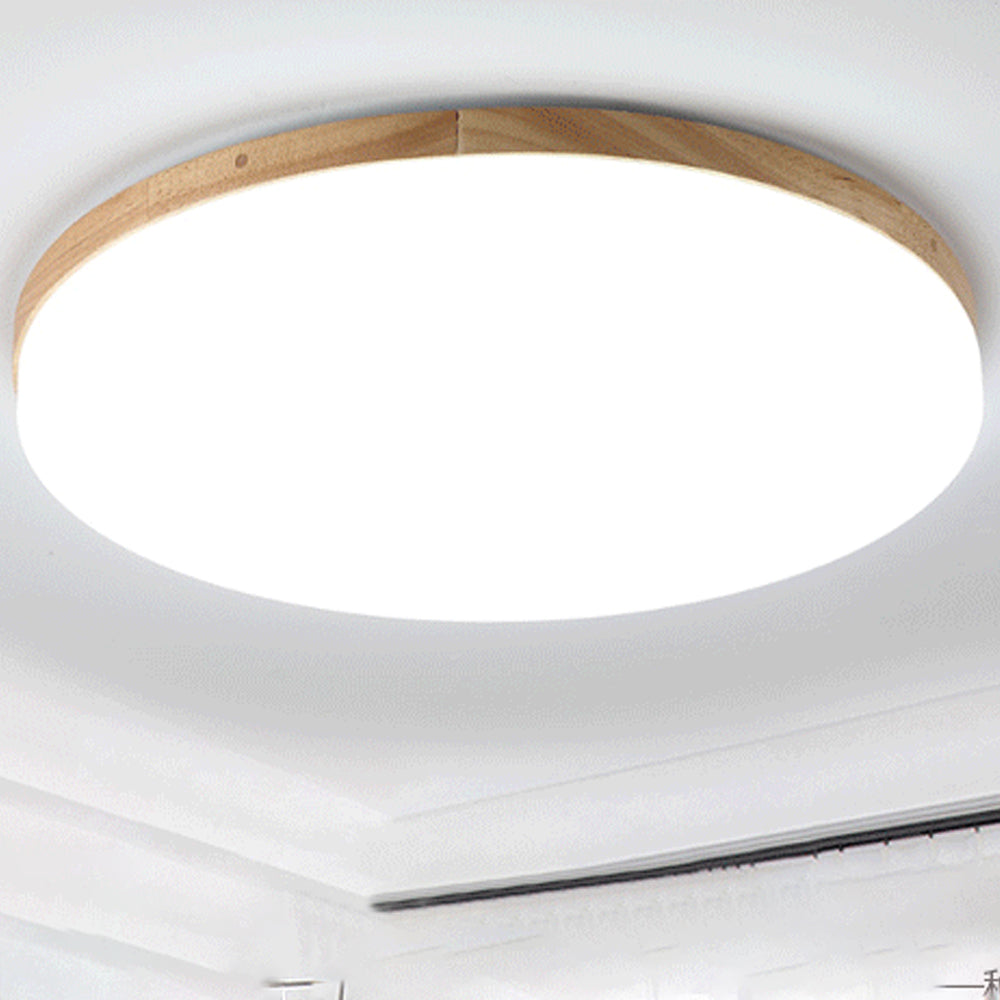 "Rund LED taklampe i akryl, elegant design, energieffektiv, moderne belysning, jevn lysfordeling, stilren interiør."