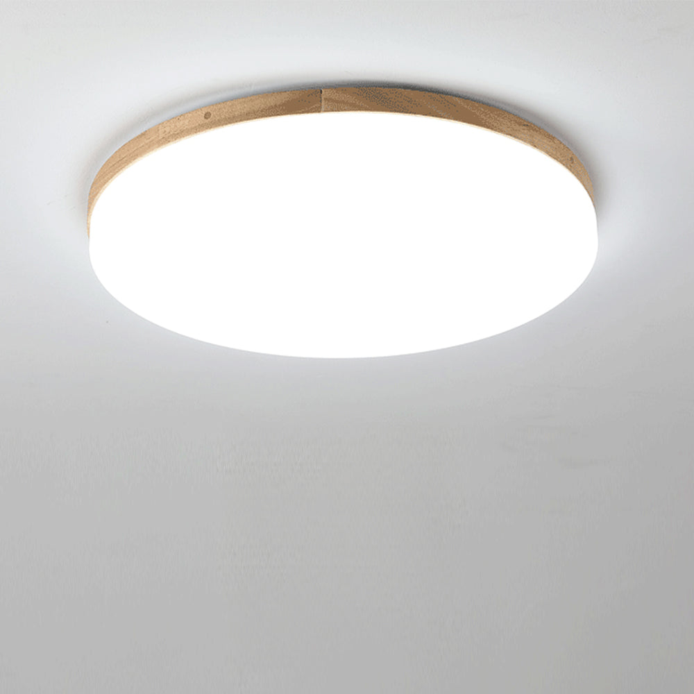 "Rund LED taklampe i akryl, elegant design, energieffektiv, moderne belysning, jevn lysfordeling, stilren interiør."