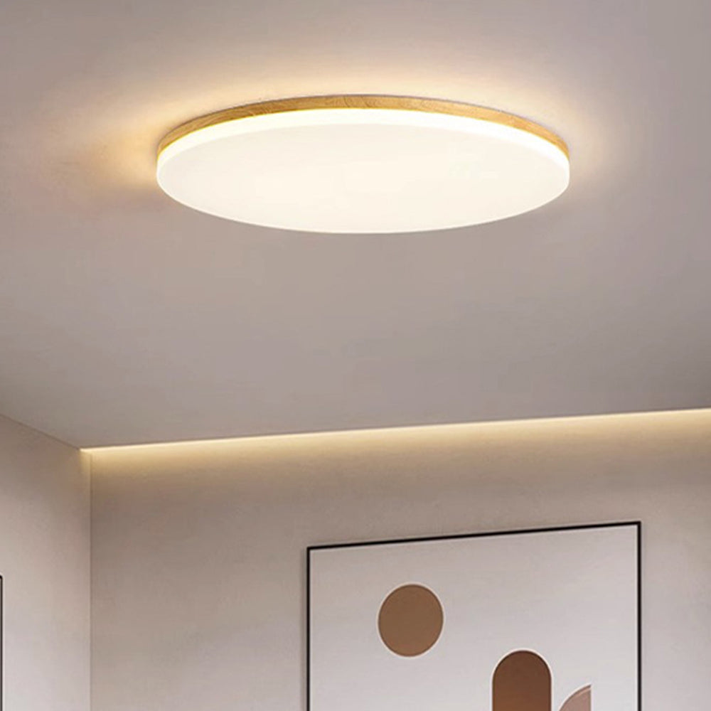 "Rund LED taklampe i akryl, elegant design, energieffektiv, moderne belysning, jevn lysfordeling, stilren interiør."