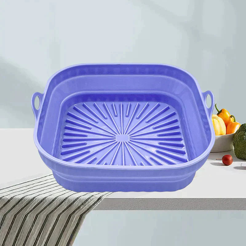"Sammenleggbar silikongrillpanne for matlaging. Rød, plassbesparende design. Perfekt til airfryers og ovn."