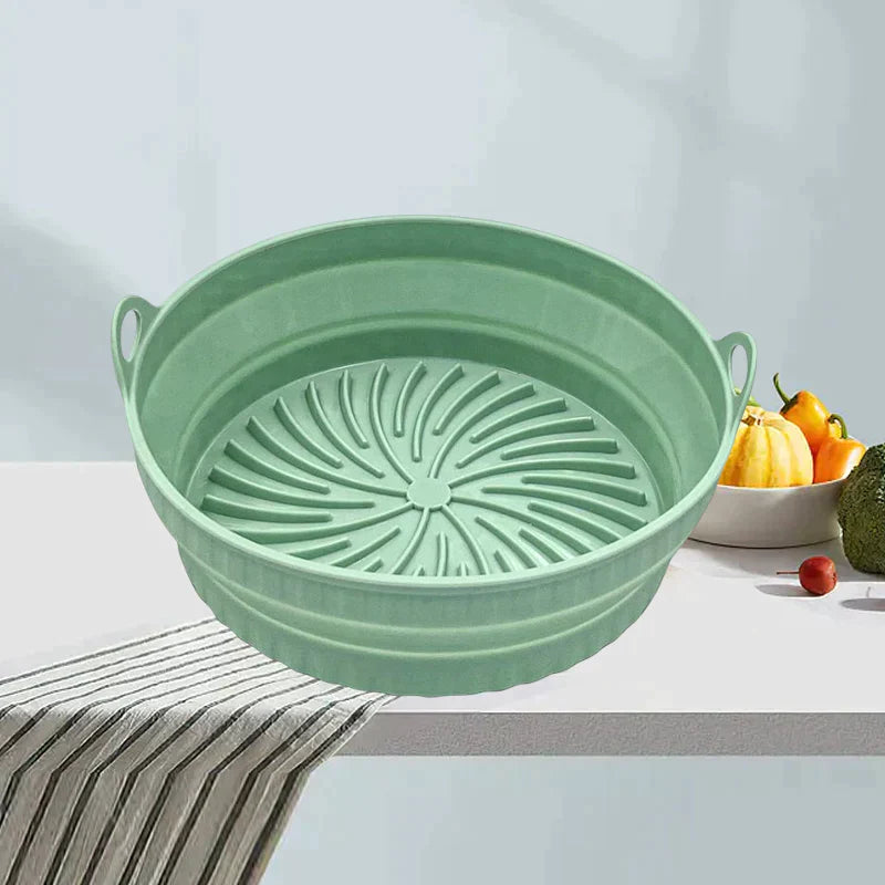 "Sammenleggbar silikongrillpanne for matlaging. Rød, plassbesparende design. Perfekt til airfryers og ovn."