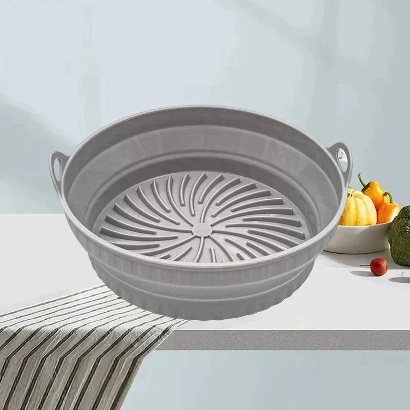 "Sammenleggbar silikongrillpanne for matlaging. Rød, plassbesparende design. Perfekt til airfryers og ovn."