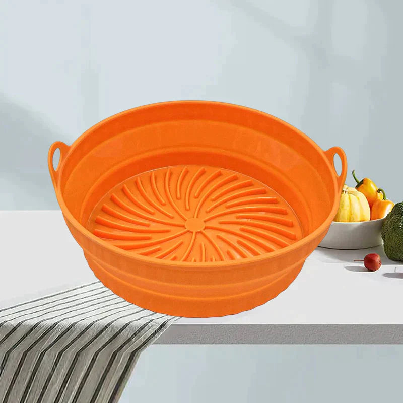 "Sammenleggbar silikongrillpanne for matlaging. Rød, plassbesparende design. Perfekt til airfryers og ovn."