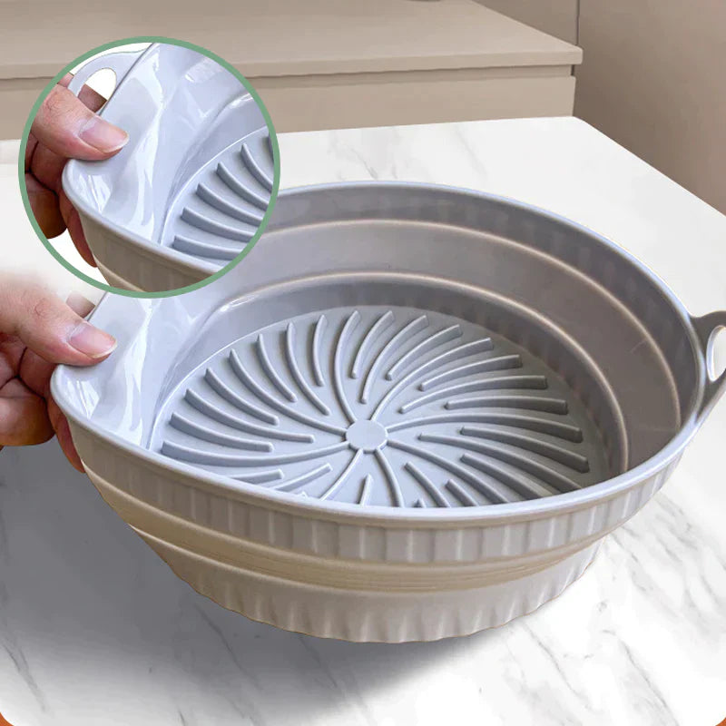 "Sammenleggbar silikongrillpanne for matlaging. Rød, plassbesparende design. Perfekt til airfryers og ovn."