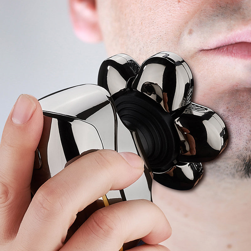 Seksblads elektrisk barbermaskin med ergonomisk design, ideell for tett barbering, avbildet i bruk mot ansiktskonturer.