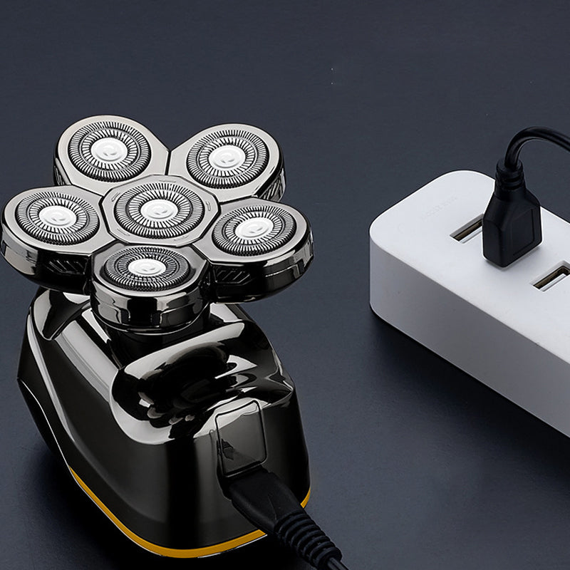 Seksblads elektrisk barbermaskin med ergonomisk design, ideell for tett barbering, avbildet i bruk mot ansiktskonturer.