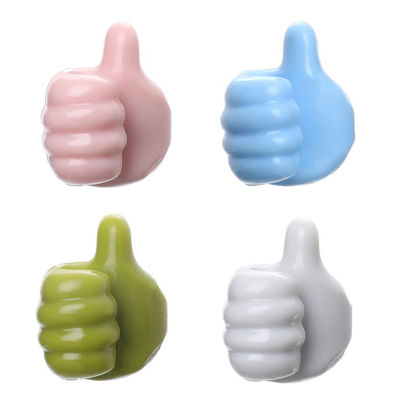 "Selvklebende kabelklemme for stilren organisering på glass, tre og metall. Ideell for datakabler, USB og penner."