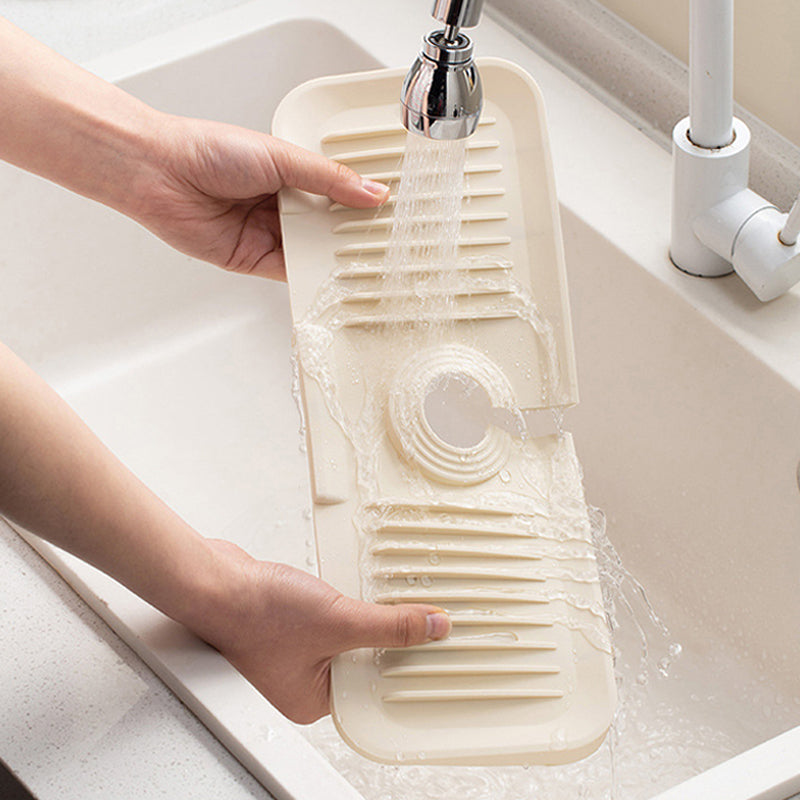 "Silikon sprutbeskyttelsesmatte - vanntett, grå, selvdrenerende design, enkel installering. Perfekt for kjøkkenvask."