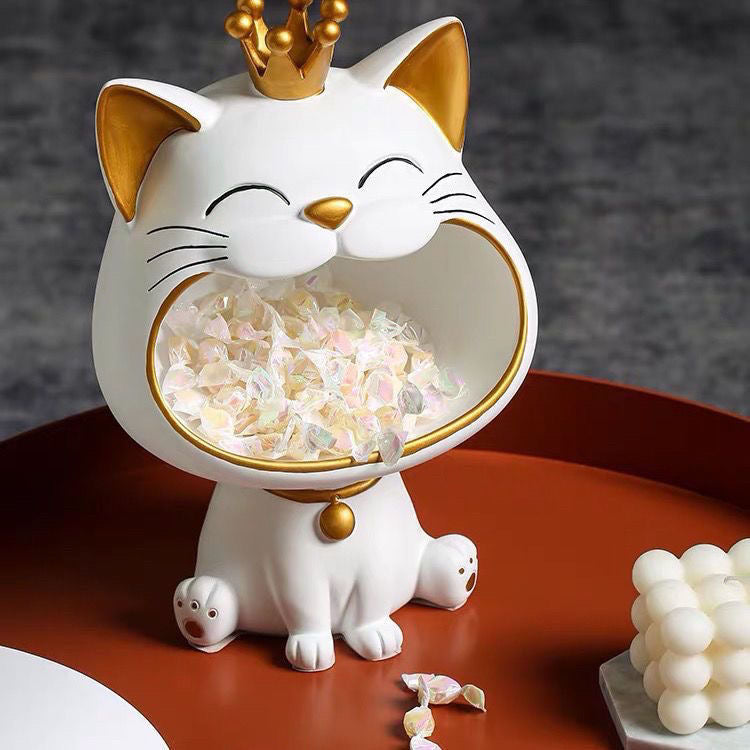 Harpiks katt statue som symboliserer lykke og velstand. En vakker interiør pyntegjenstand for stuen.