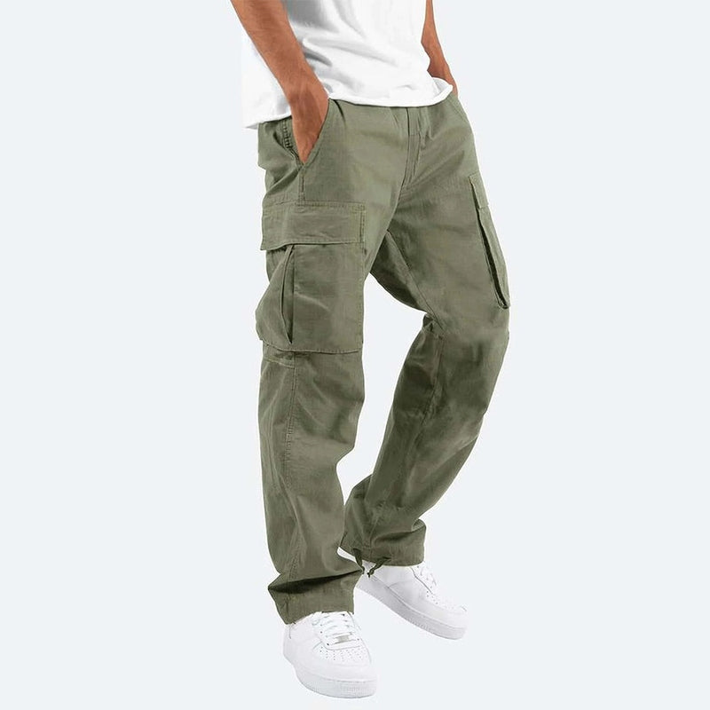 Nærbilde av stofftekstur på slim fit herre cargo bukse, bomullsmix, i grå farge.