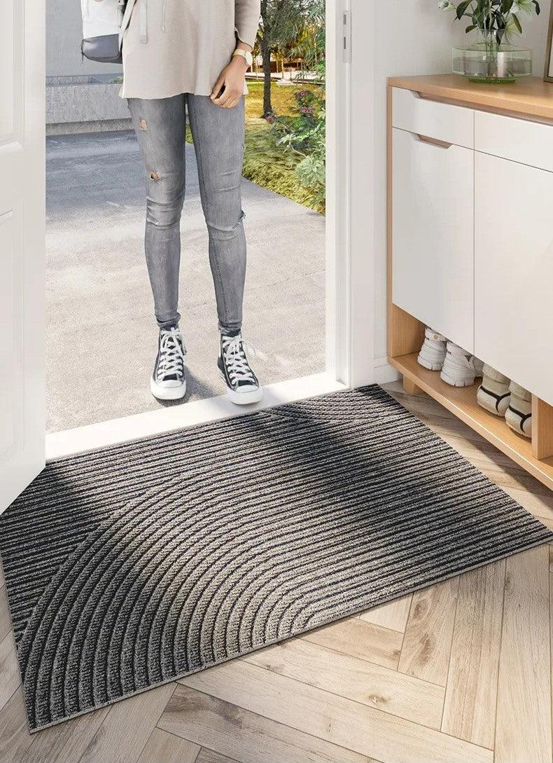 "Slitesterk, sklisikker dørmatte i blått PVC, ideell for innendørs og utendørs bruk. Enkel å rengjøre, ren design."