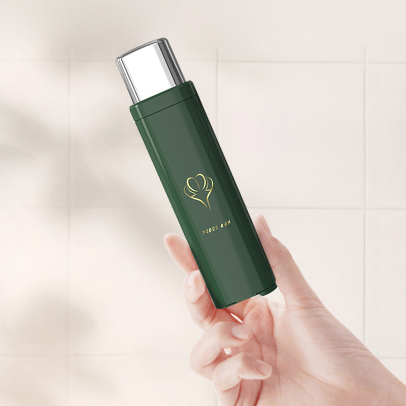 "Smart bærbar tanntråddispenser, kompakt for hygiene på farten, med plass til 8 tråder. Tilgjengelig i grønn, hvit, rosa."